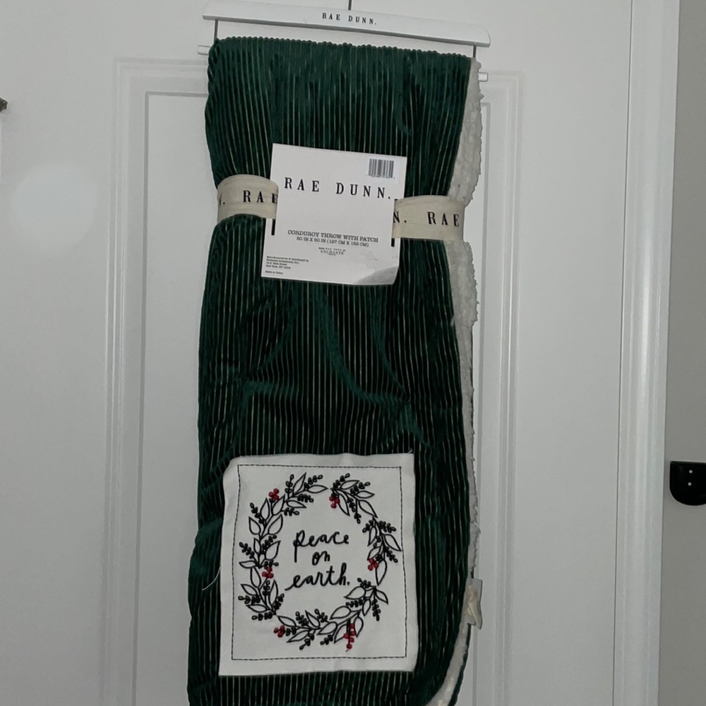 Rae Dunn green corduroy Peace on Earth throw blanket